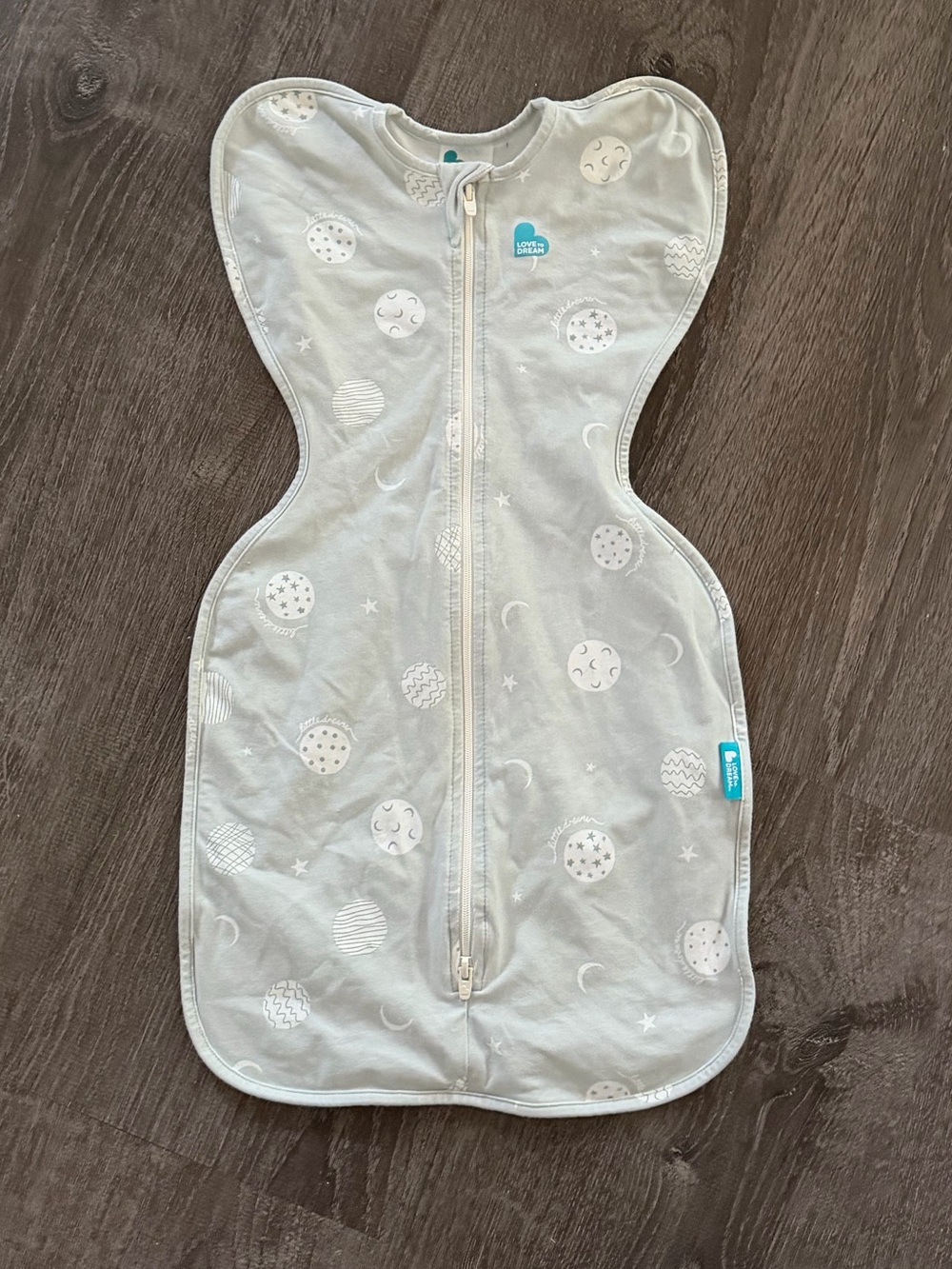 Love to Dream gray zip-up swaddle with moon print